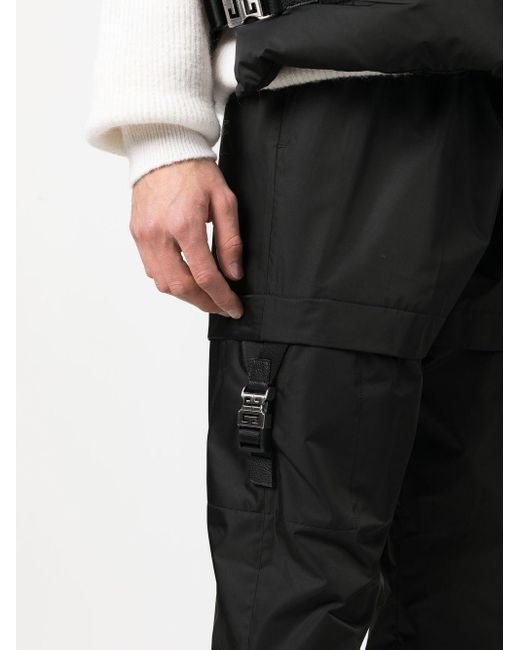 Pantalones rectos con detalle de hebilla Givenchy de hombre de color Black