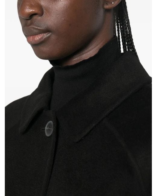 The Dynamis Studio Black Raglan-Sleeve Button-Down Coat