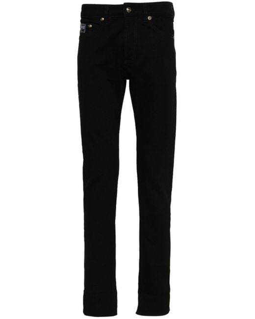 Versace Black Watercolour Couture Tapered Jeans for men