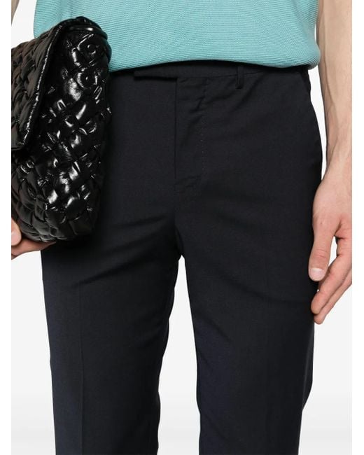 PT Torino Black Travel Mid-Rise Tapered Trousers for men