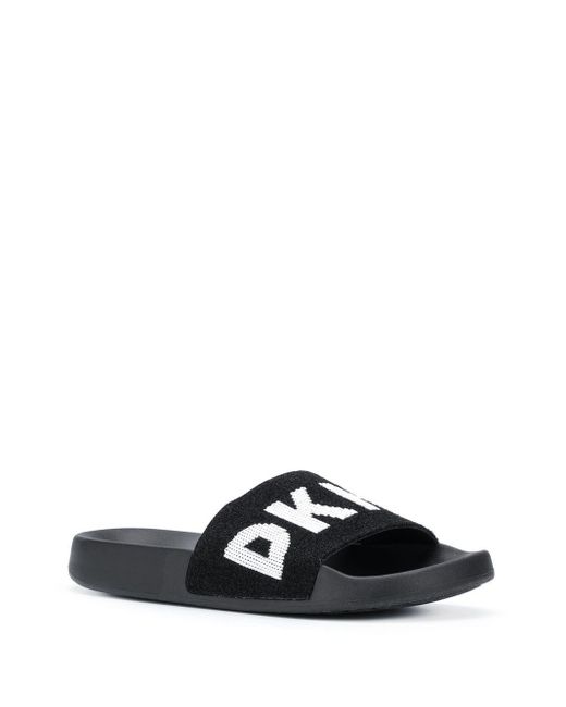 DKNY Rubber Zax Logo Band Slides in Black - Lyst