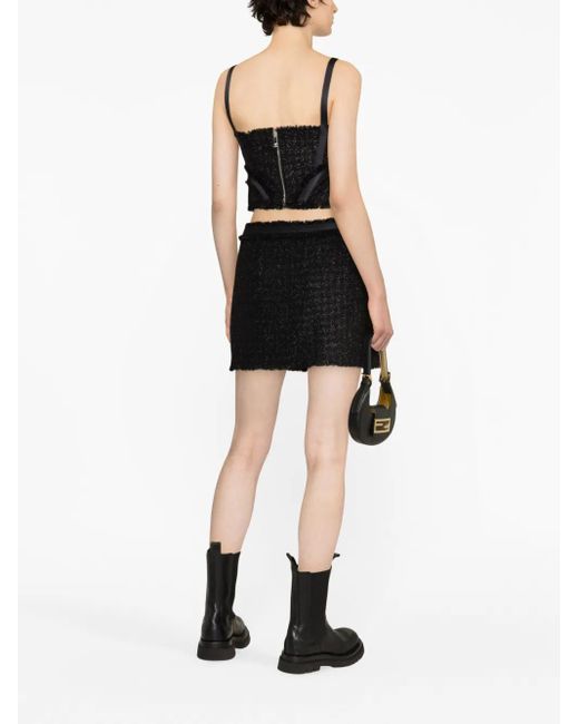 Mini-jupe Versace en coloris Black