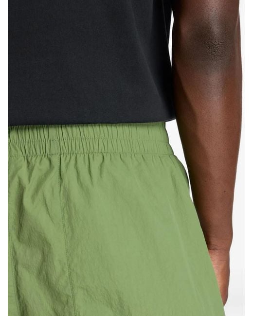 New Balance Green Castlefield Woven 7" Shorts for men