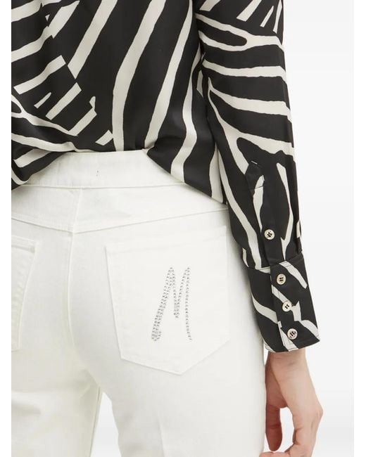 Marciano White Embellished-logo pocket jeans