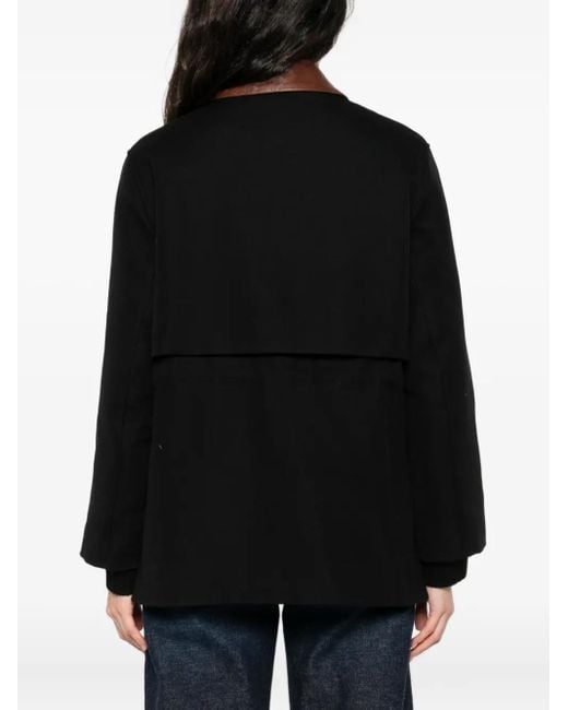 Chaqueta con botones y cuello de piel Maje de color Black