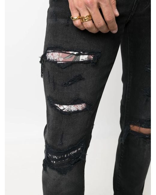 Amiri Blue Ripped Slim-Fit Jeans for men