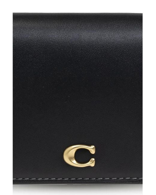Cartera con cremallera COACH de color Black