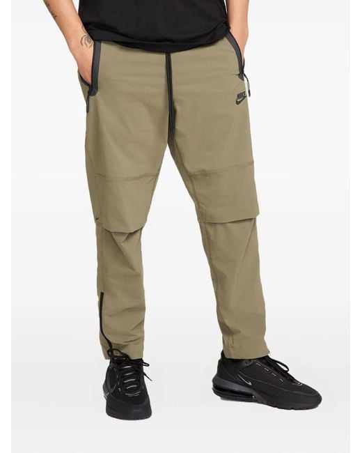 Nike Tech Woven Trainingsbroek in het Green voor heren