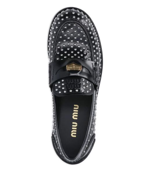 Mocassins Cloutés À Entaille Penny Miu Miu en coloris Black