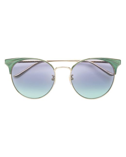 Oversized cat eye sunglasses Gucci en coloris Metallic