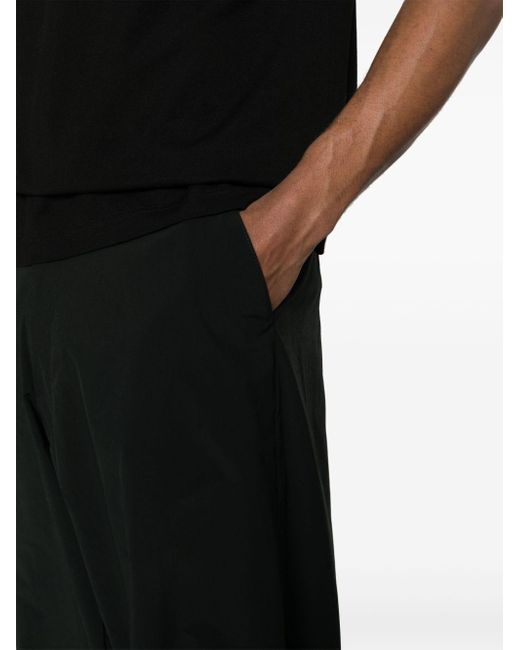 Pantalones anchos impermeables Prada de hombre de color Black