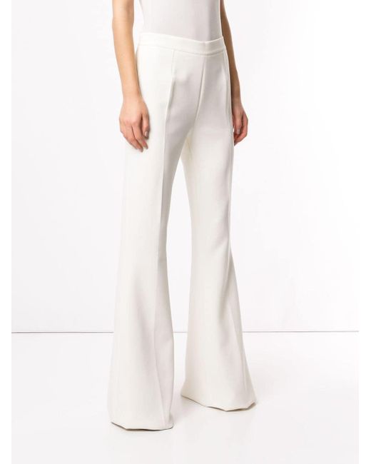 Safiyaa Synthetic Flare Trousers in White - Lyst
