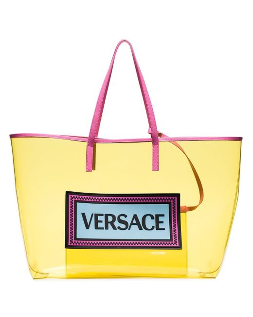 Bolso shopper de PVC con logo Versace de color Amarillo | Lyst