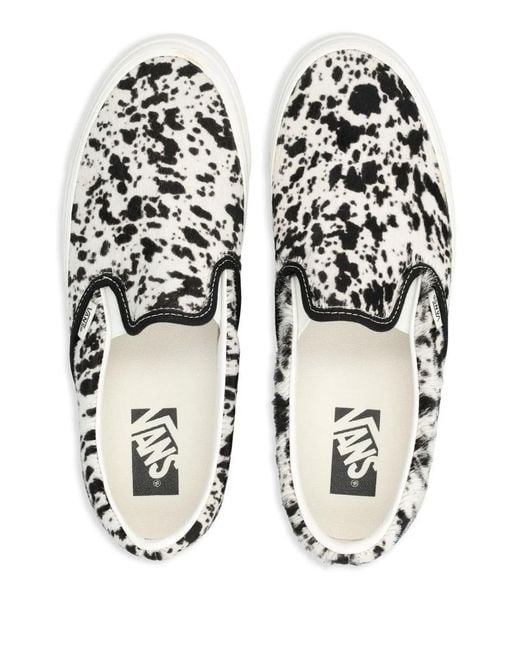 Vans White Slip-On Sneakers
