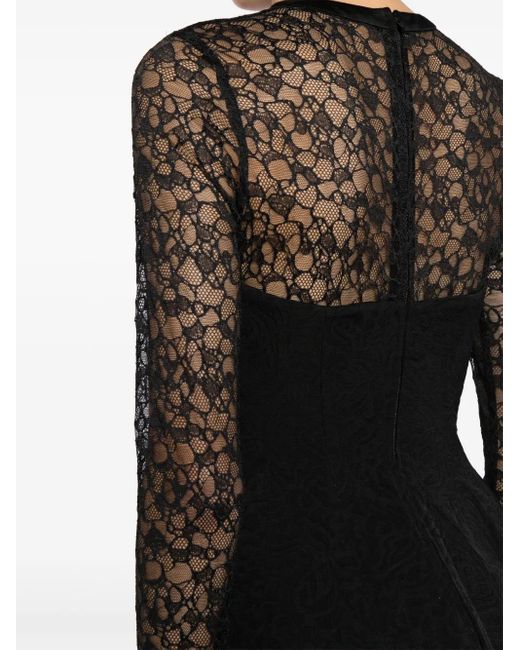 Jonathan Simkhai Peplum Top in het Black