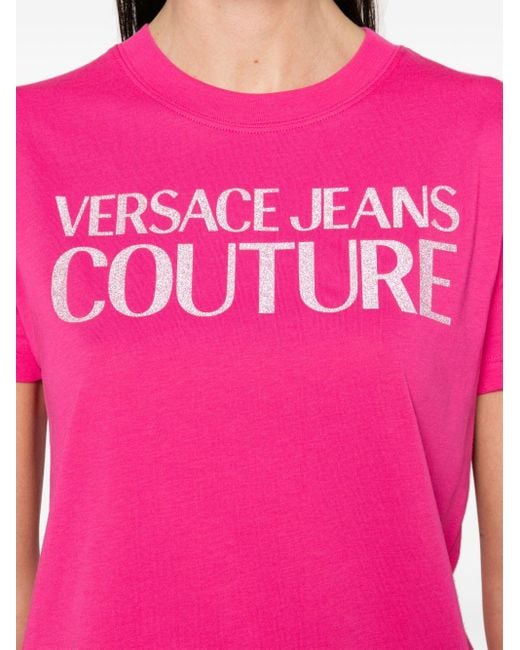 Camiseta con logo de purpurina Versace de color Pink
