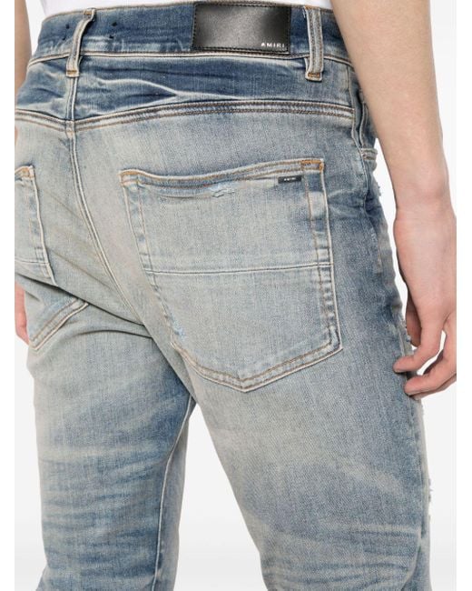 Amiri Blue Distressed Slim-cut Jeans for men