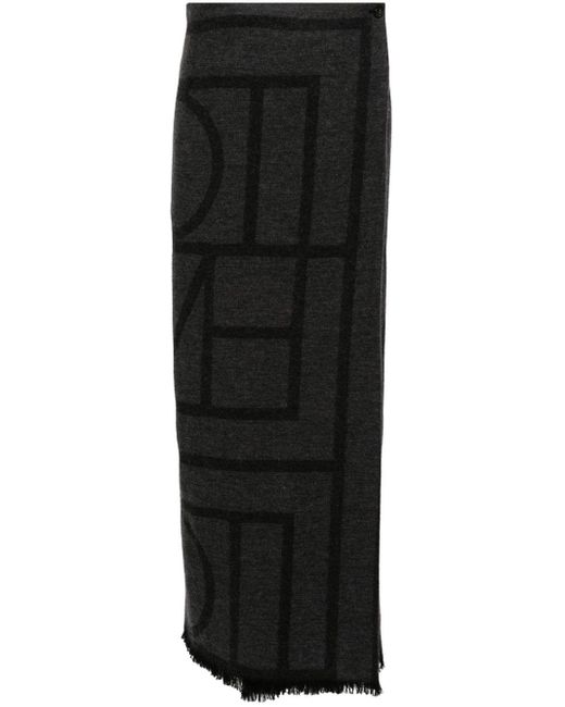 Jupe longue à logo en jacquard Totême  en coloris Black