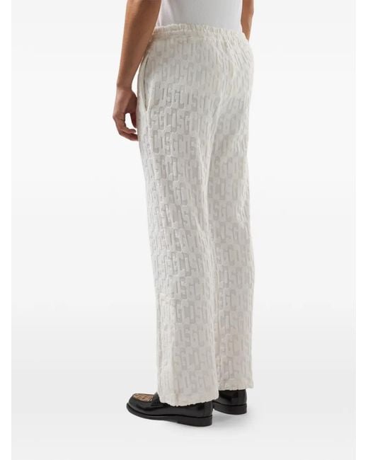 Gcds White Monogram-Pattern Trousers for men