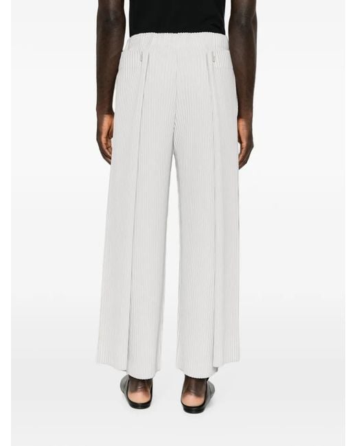 Homme Plissé Issey Miyake White Motion Blur Pleated Trousers for men