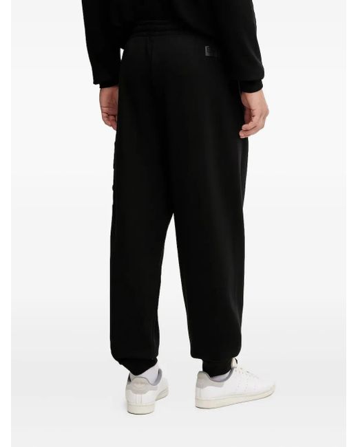 EA7 Black Embossed-Logo Track Pants for men