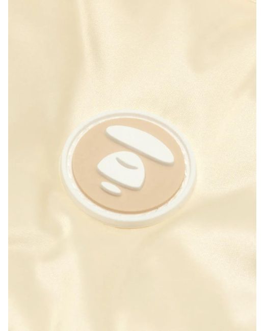 Chaleco acolchado con placa del logo Aape By A Bathing Ape de hombre de color Natural