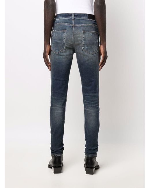 Amiri Blue Distressed Skinny Fit Jeans for men