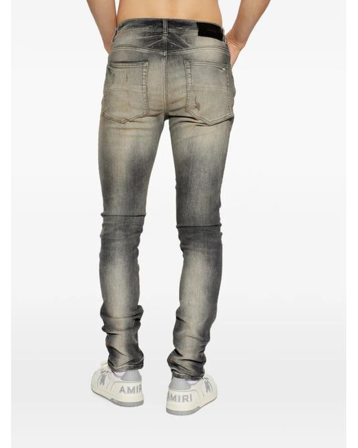 Jean À Design Patchwork Et Effet Usé Amiri pour homme en coloris Gray