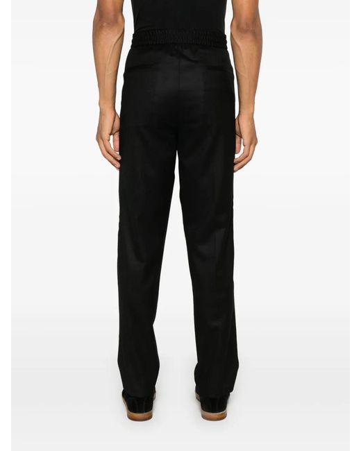 Brunello Cucinelli Black Pleat-Detail Tapered Trousers for men