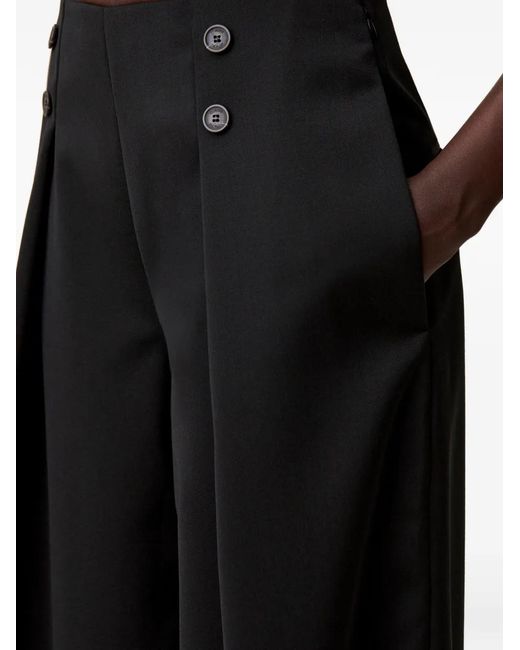 Pantalones con detalle de botones Claudie Pierlot de color Black