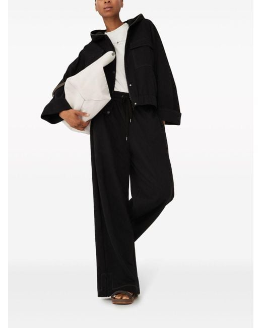 Chaqueta con capucha y costura en contraste Brunello Cucinelli de color Black