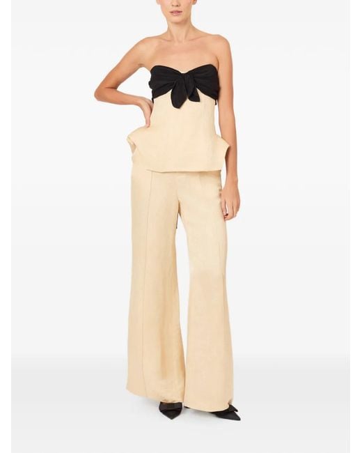 Rosie Assoulin Black Bow Peplum Top