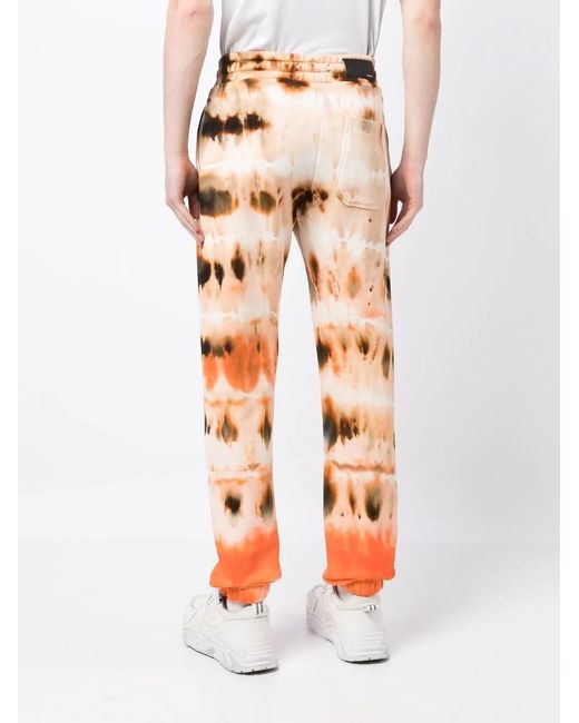 Amiri Orange Tie-Dye Print Cotton Track Pants for men