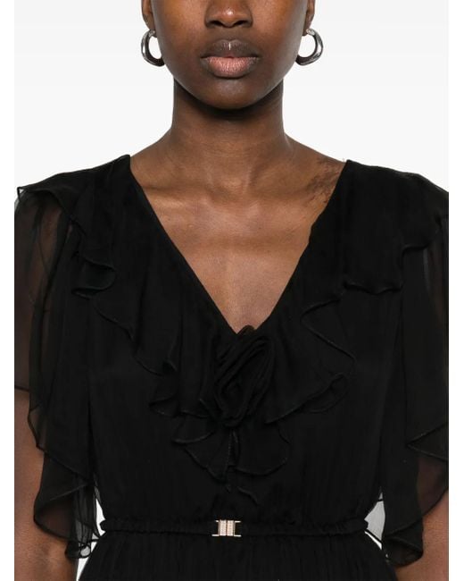 Vestido midi de seda con apliques florales Nissa de color Black