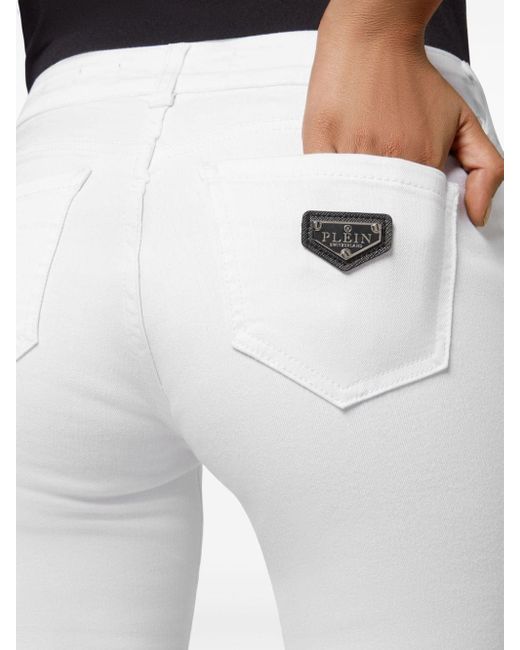 Jeans skinny con placca logo di Philipp Plein in White