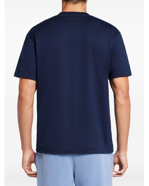 Camiseta con eslogan estampado Lacoste de hombre de color Blue