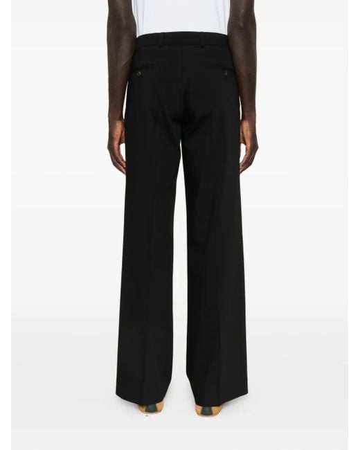 Pantaloni Con Tasche A Filetto di Sandro in Black da Uomo
