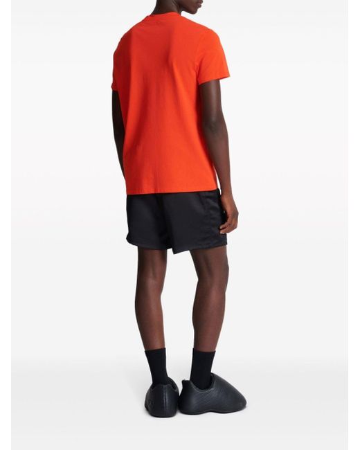 Balmain T-Shirt mit beflocktem Logo in Orange für Herren