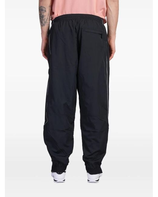 Nike Blue Solo Swoosh Track Pants for men