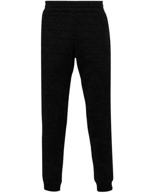 Pantaloni sportivi con logo jacquard di Moschino in Black da Uomo