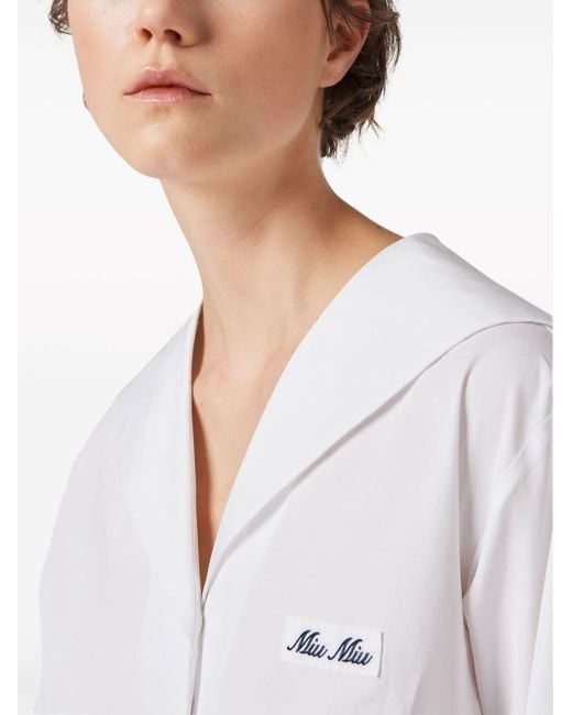 Robe-chemise à logo brodé Miu Miu en coloris White