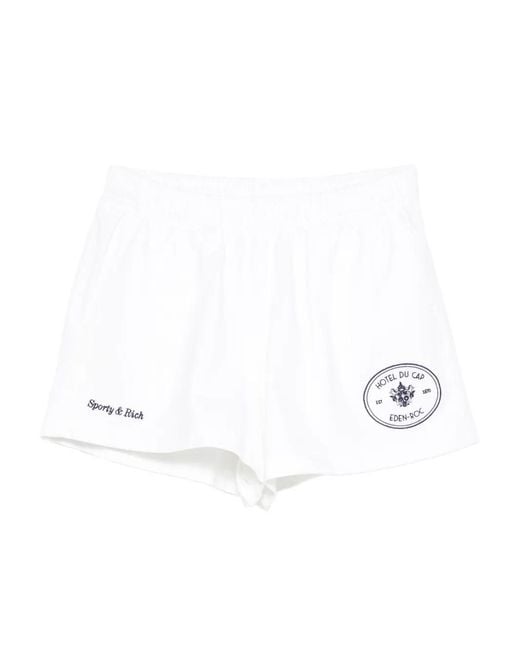 Sporty & Rich White X Hotel Du Cap Eden Roc Eden Crest Logo-Embroidered Trousers