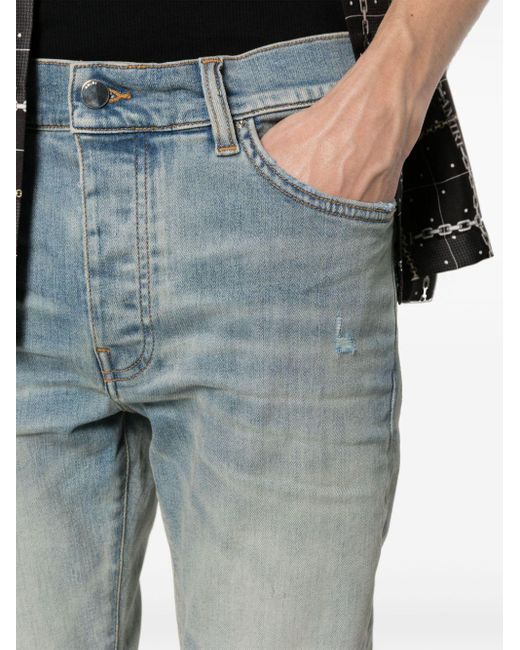 Jeans skinny con effetto vissuto di Amiri in Blue da Uomo