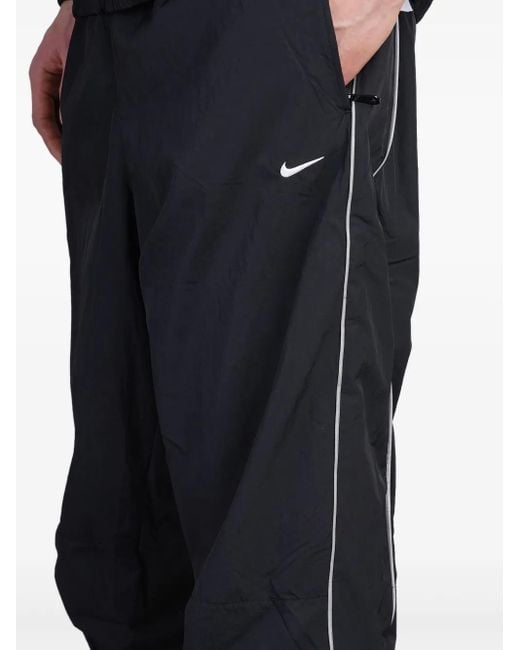 Nike Blue Solo Swoosh Track Pants for men