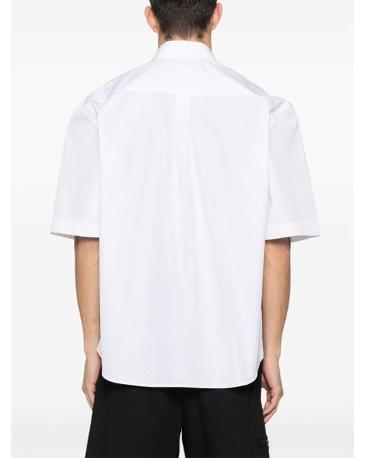 Chemise à slogan brodé Moschino pour homme en coloris White