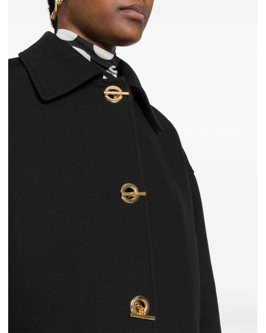 Manteau en laine vierge mélangée Moschino en coloris Black