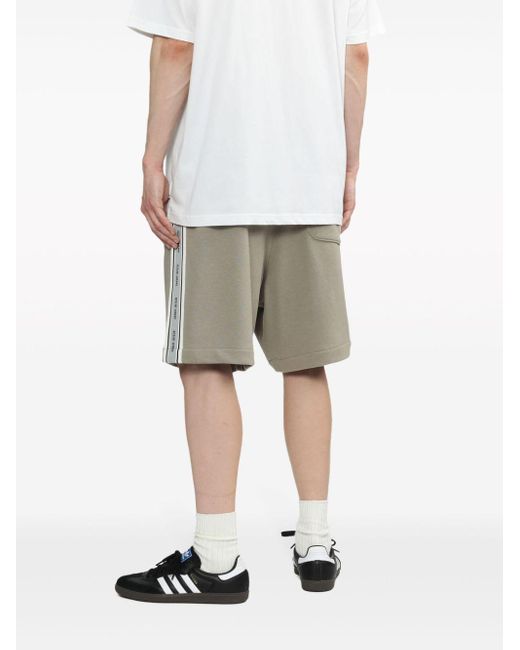 Pantalones cortos de deporte con logo Izzue de hombre de color Gray