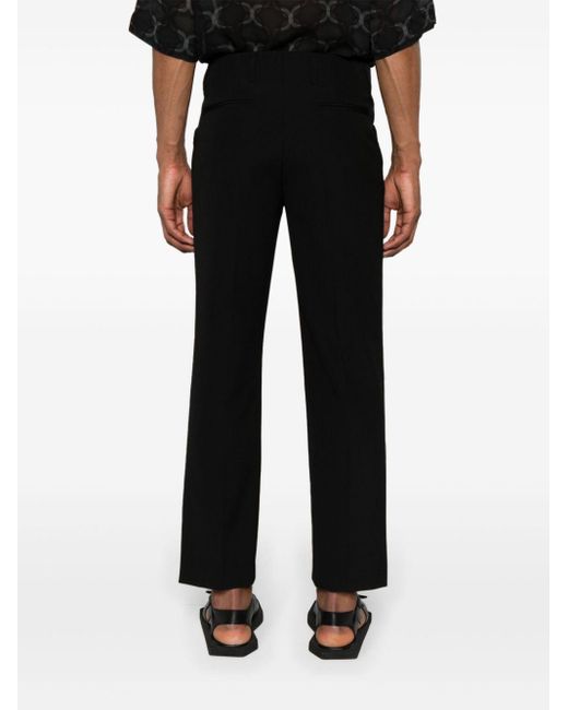 Pantalones de talle medio con detalle de bolsillo Dries Van Noten de hombre de color Black