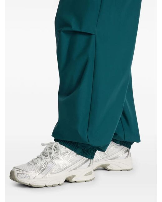 New Balance Green Trackside Woven Track Pants