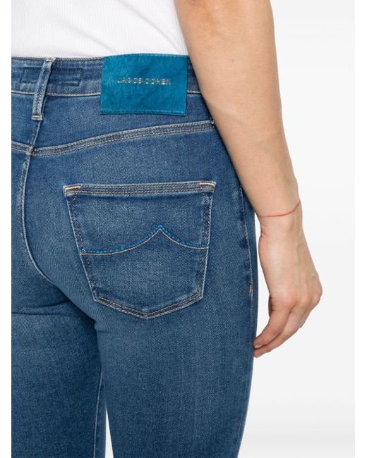 Logo-embroidered tapered jeans di Jacob Cohen in Blue